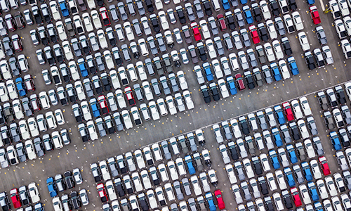 Overhead view of a full car lot